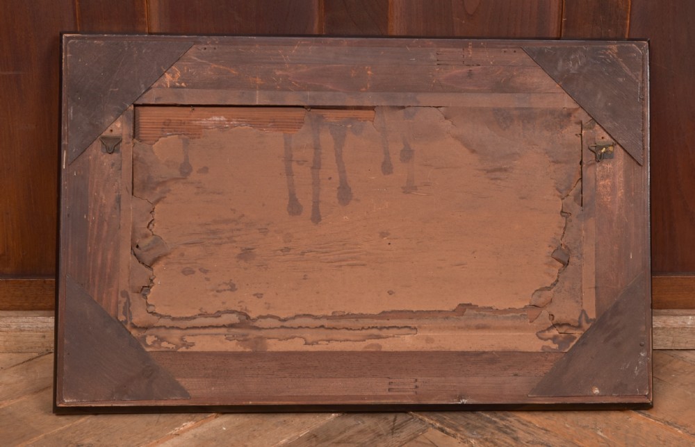 A 19th-century cast metal high-relief plaque depicting The Last Supper mounted inside a deep, black ebonised wooden frame. View V