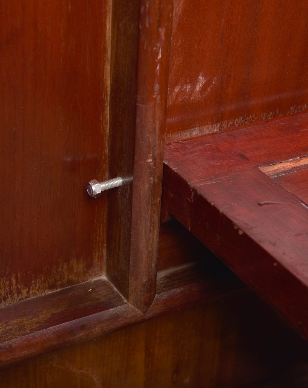 A Victorian mahogany tilt-top table featuring a polished rectangular top with rounded corners set upon a carved pedestal stem with quadruped scrolled legs. View XII