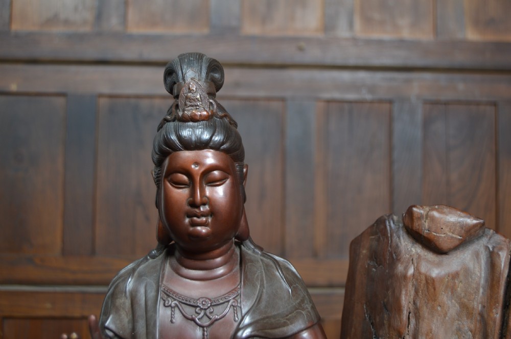 Guanyin Bodhisattva bronze with Root Wood Stand View V