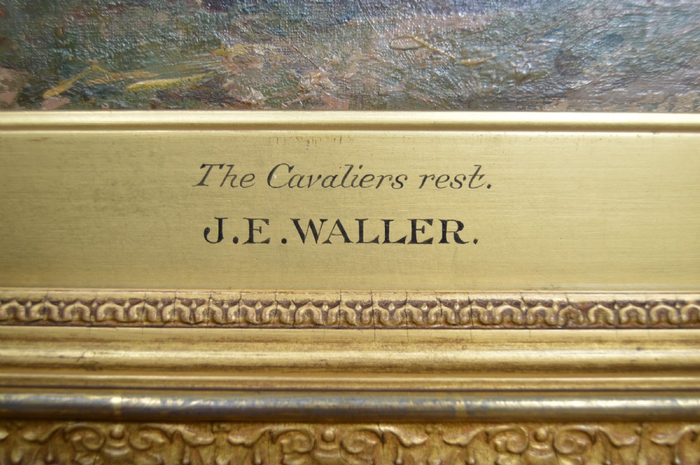 An antique oil painting depicting 17th-century cavaliers resting outside an inn, presented in an ornate gold gilt frame with an artist plaque. View V