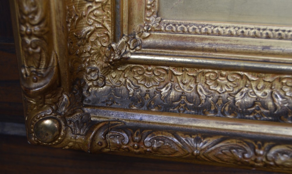 An antique oil painting depicting 17th-century cavaliers resting outside an inn, presented in an ornate gold gilt frame with an artist plaque. View VIII