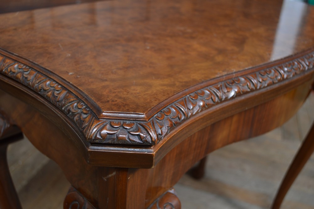 An antique walnut fold-over games table featuring carved cabriole legs, pad feet, and a figure-grained burr walnut top. View V