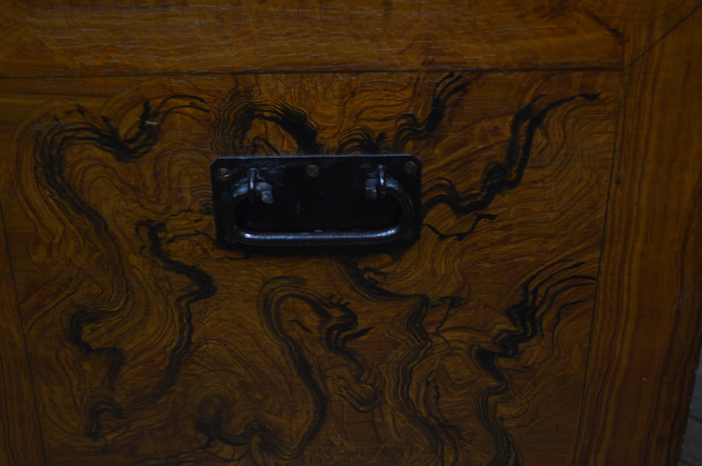 A Victorian scumbled painted wooden storage chest featuring decorative swirl faux-grain patterns, a lower drawer with brass recessed handles, and turned feet. View XIV