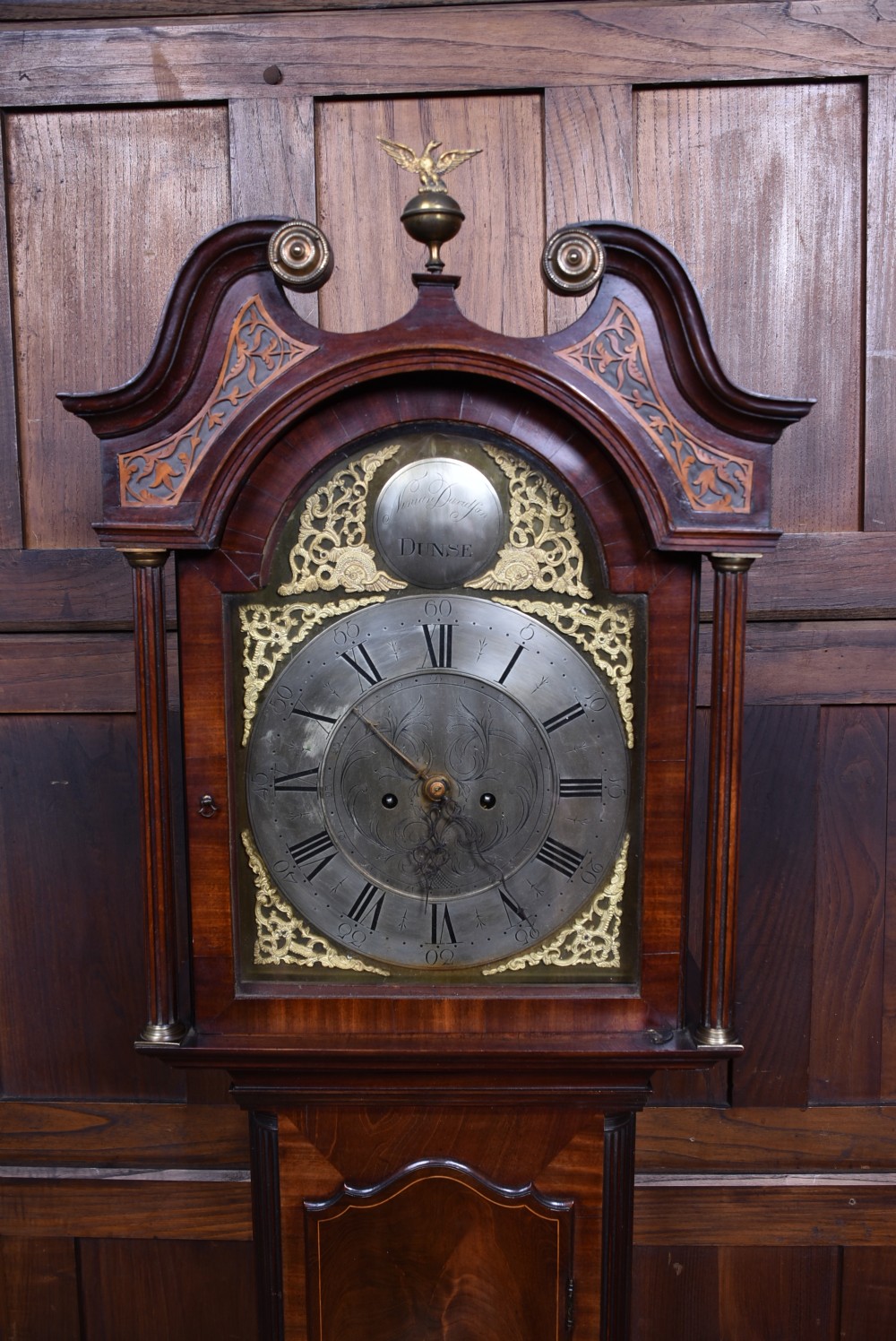 An antique Scottish mahogany longcase clock featuring a swan-neck pediment with an eagle finial and an engraved brass dial face. View III