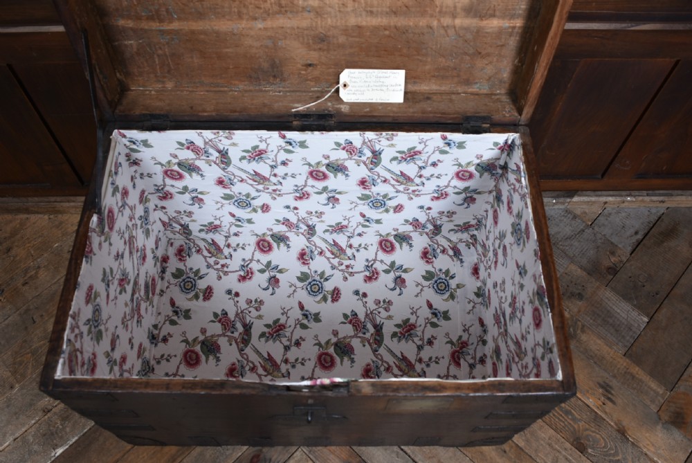 A dark oak Victorian silver chest featuring heavy black iron straps, corner brackets, studded detailing, and an engraved brass plaque on the front. View XII