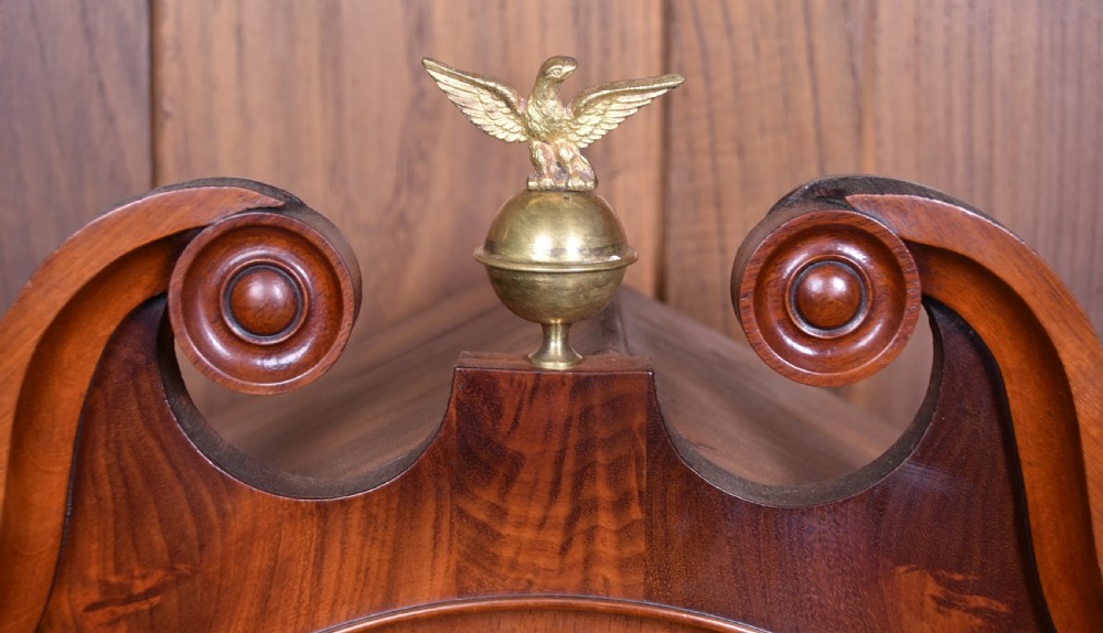A nineteenth-century Scottish flame mahogany longcase clock featuring a swan-neck pediment, barley twist columns, and a hand-painted dial depicting sailing ships. View III