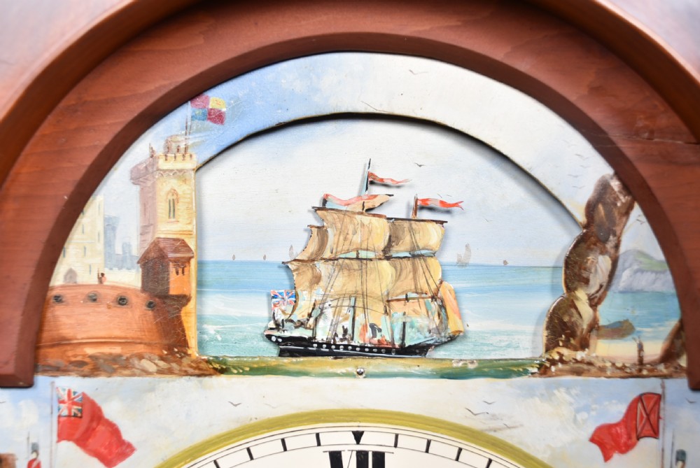 A nineteenth-century Scottish flame mahogany longcase clock featuring a swan-neck pediment, barley twist columns, and a hand-painted dial depicting sailing ships. View VII