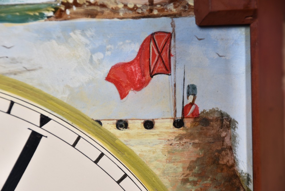 A nineteenth-century Scottish flame mahogany longcase clock featuring a swan-neck pediment, barley twist columns, and a hand-painted dial depicting sailing ships. View IX