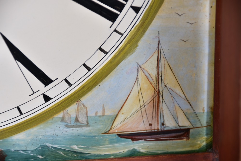 A nineteenth-century Scottish flame mahogany longcase clock featuring a swan-neck pediment, barley twist columns, and a hand-painted dial depicting sailing ships. View XI