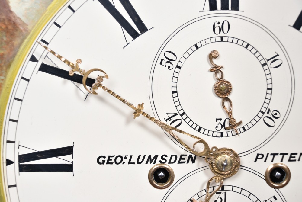 A nineteenth-century Scottish flame mahogany longcase clock featuring a swan-neck pediment, barley twist columns, and a hand-painted dial depicting sailing ships. View XII