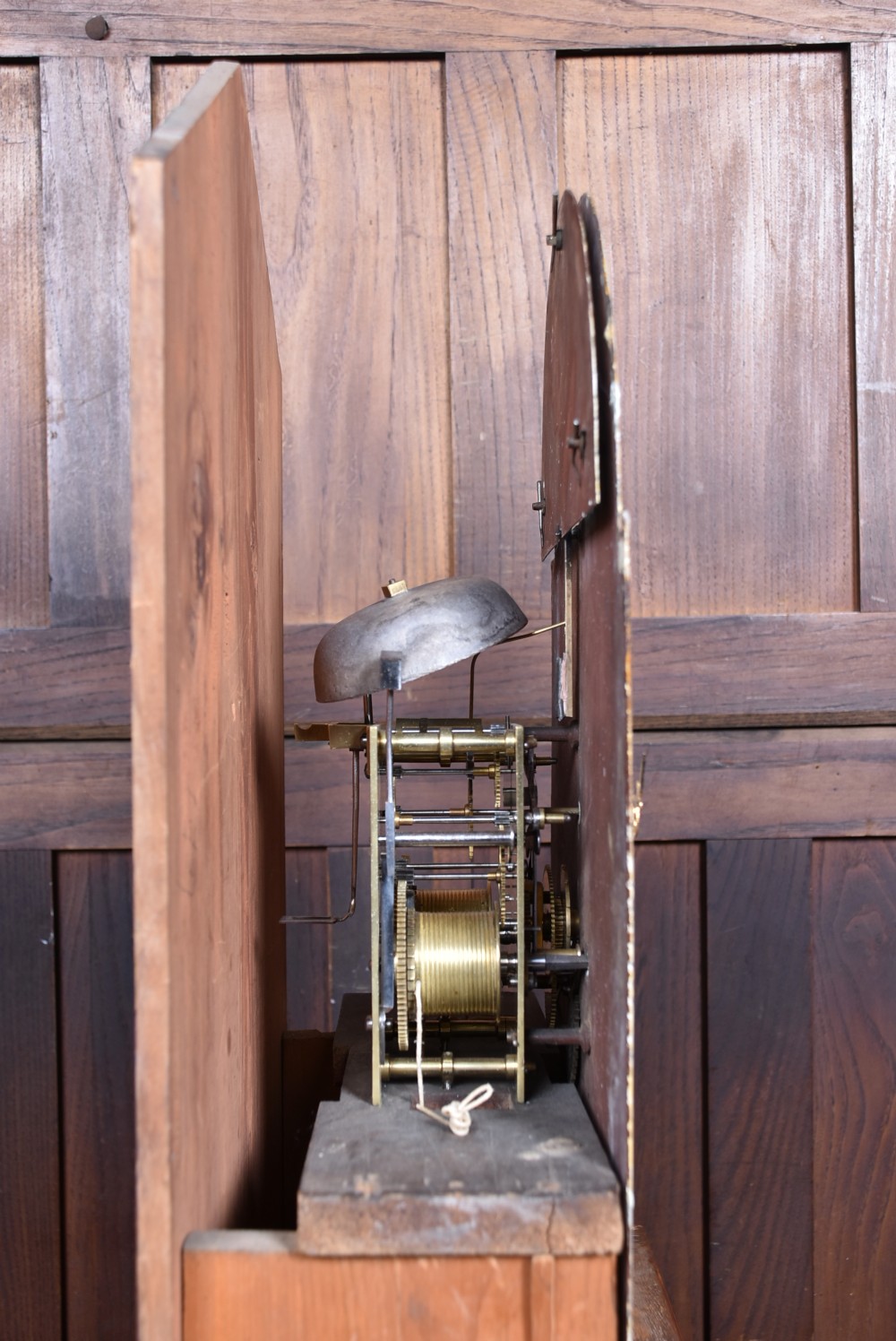 A nineteenth-century Scottish flame mahogany longcase clock featuring a swan-neck pediment, barley twist columns, and a hand-painted dial depicting sailing ships. View XIX