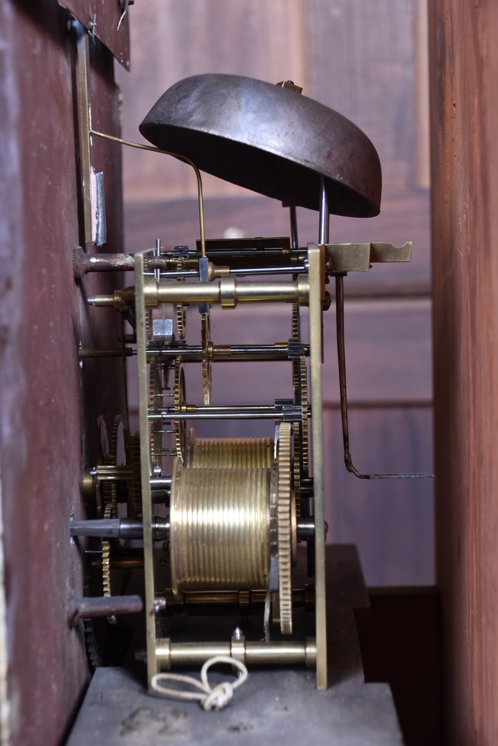A nineteenth-century Scottish flame mahogany longcase clock featuring a swan-neck pediment, barley twist columns, and a hand-painted dial depicting sailing ships. View XXIV