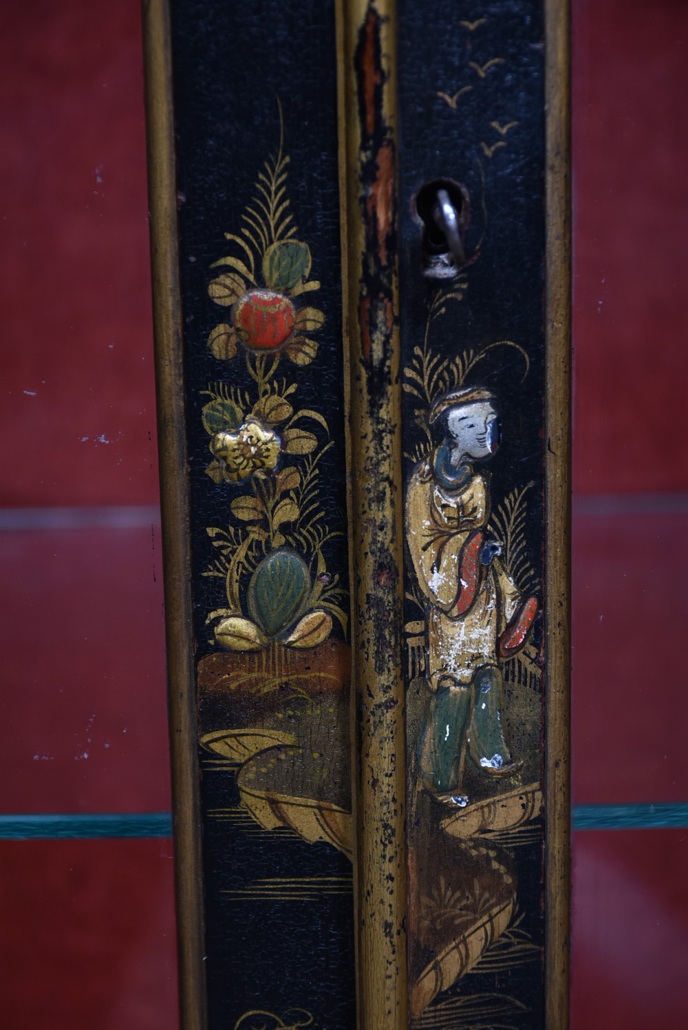 An Edwardian black lacquered display cabinet featuring hand-painted gold Chinoiserie motifs, arched astragal glazing, and cabriole legs. View IX