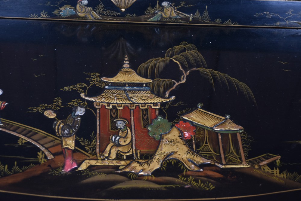 An Edwardian black lacquered display cabinet featuring hand-painted gold Chinoiserie motifs, arched astragal glazing, and cabriole legs. View XIII