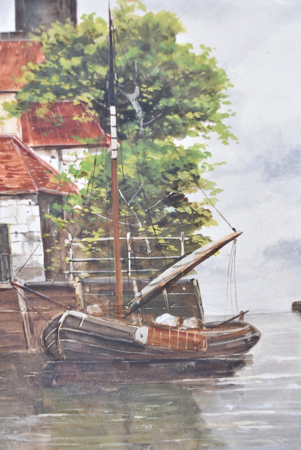 A pair of framed Victorian watercolour paintings depicting Dutch coastal scenes with windmills, boats, and canal buildings, finished with terracotta mounts and silvered frames. View XII