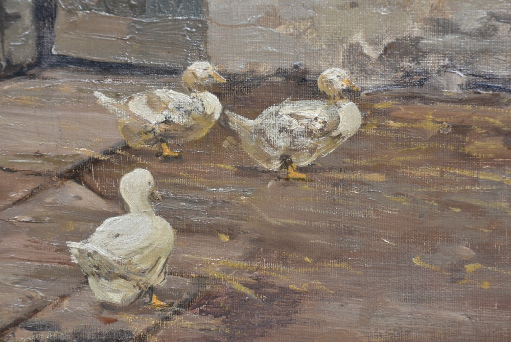 A framed oil painting depicting a woman working beside a water trough in a stone farmyard with white ducks in the foreground. View IX