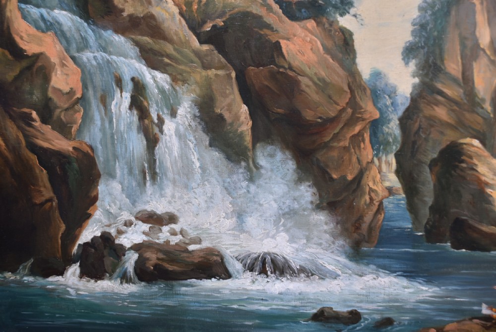 An 18th-century classical landscape oil painting on canvas featuring a waterfall, rocky cliffs, and distant river set within a moulded giltwood frame. View V