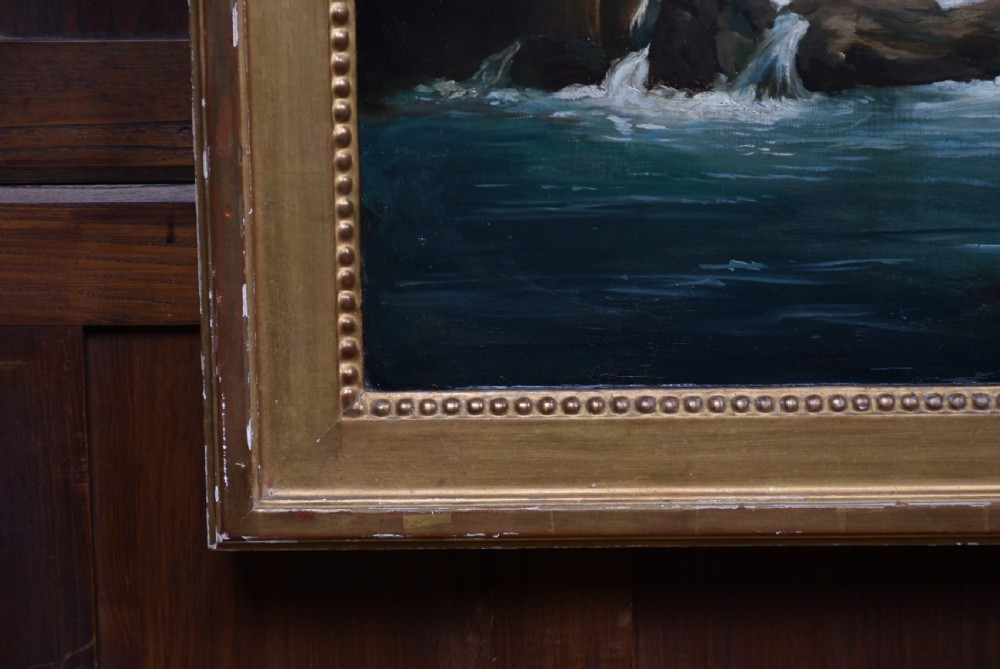 An 18th-century classical landscape oil painting on canvas featuring a waterfall, rocky cliffs, and distant river set within a moulded giltwood frame. View IX