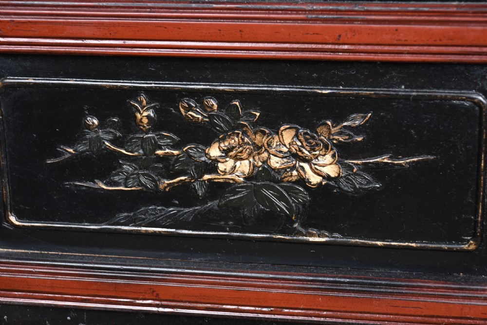 A four-panel tall folding room screen featuring red-lacquered timber framing, intricate black lattice fretwork, and carved gilded lower panels. View XIV