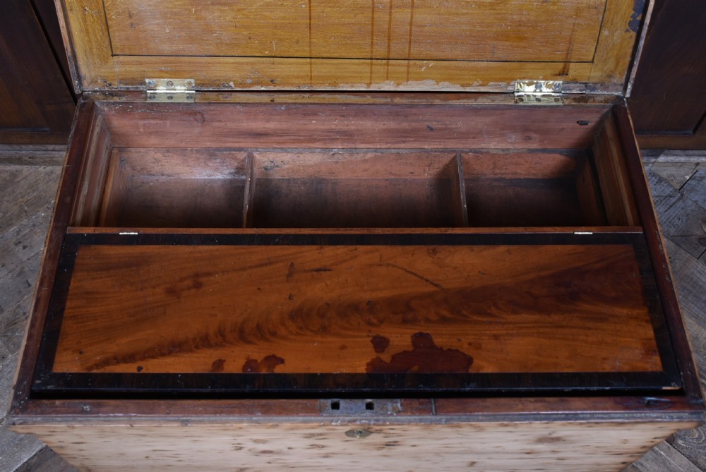 A Victorian rosewood drop-leaf work table featuring a turned column, fabric-covered sewing basket underneath, and a quadform base with scroll feet. View XXII