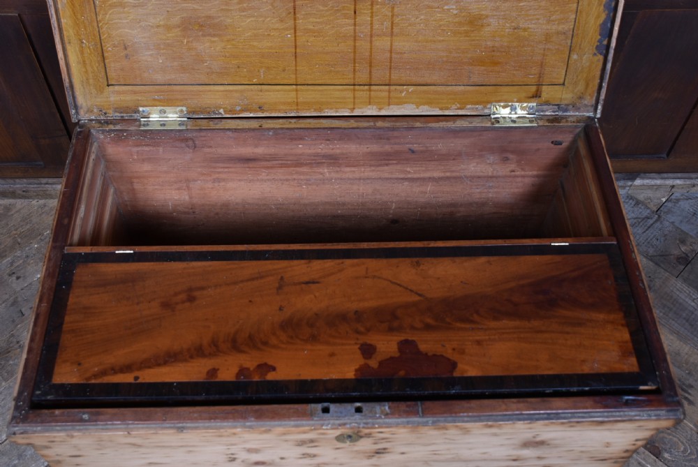 A Victorian rosewood drop-leaf work table featuring a turned column, fabric-covered sewing basket underneath, and a quadform base with scroll feet. View XXIII