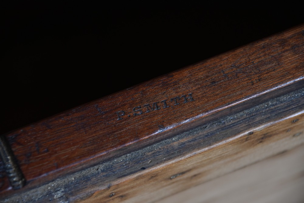 A Victorian rosewood drop-leaf work table featuring a turned column, fabric-covered sewing basket underneath, and a quadform base with scroll feet. View XXIV