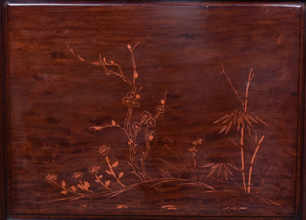 A dark brown carved Chinese hardwood table screen featuring relief-carved phoenix and floral motifs on a central panel set into a stand with openwork fretwork. View XIII