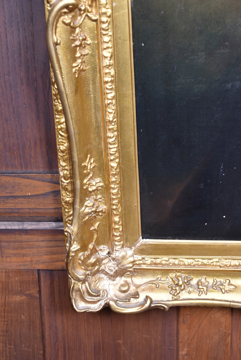 A nineteenth-century oil painting depicting a gentleman in dark formal wear within a carved gilded frame. View VII