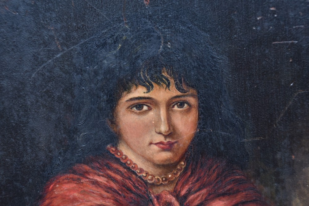 A late nineteenth-century oil painting on a bevelled wooden panel depicting a barefoot young woman wearing a red shawl. View II