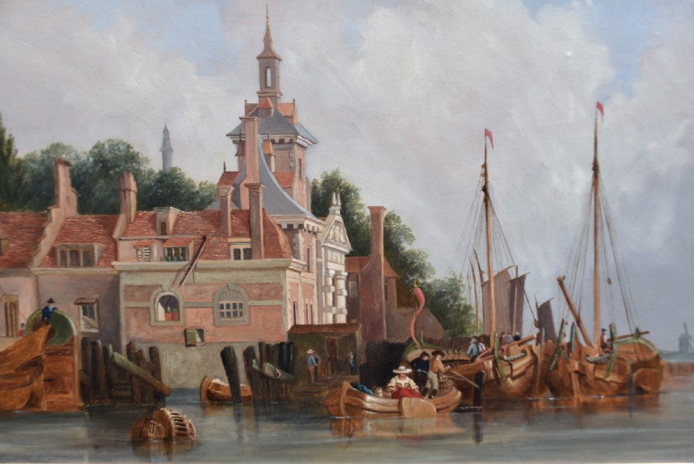 A framed oil painting depicting sailboats in a Dutch harbour beside historic brick buildings under a cloudy sky. View IV