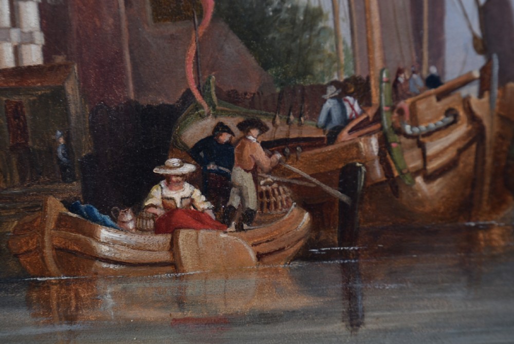 A framed oil painting depicting sailboats in a Dutch harbour beside historic brick buildings under a cloudy sky. View V