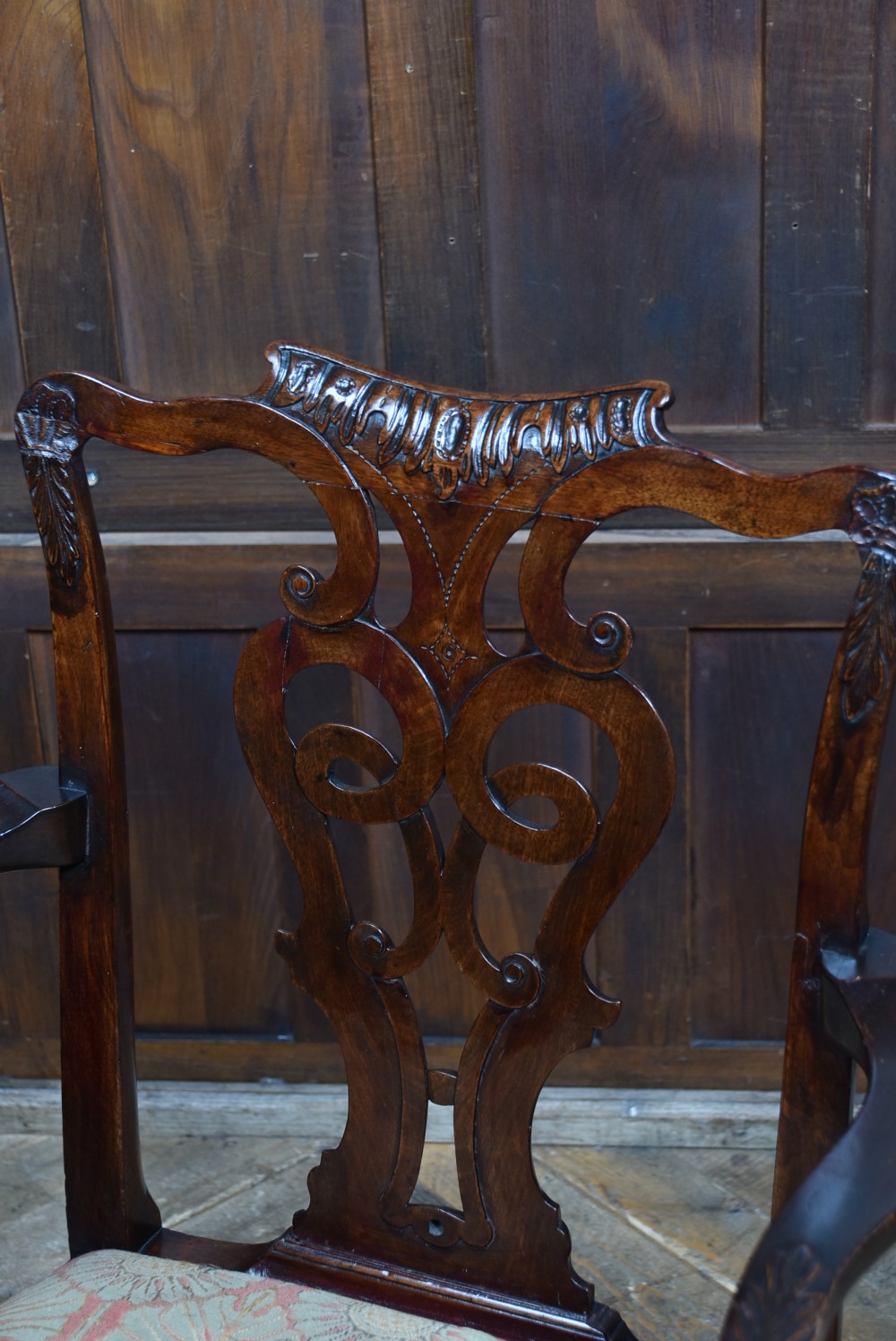 A Georgian mahogany open armchair featuring a pierced carved back splat, out-swept arms, patterned upholstery, and cabriole front legs. View III