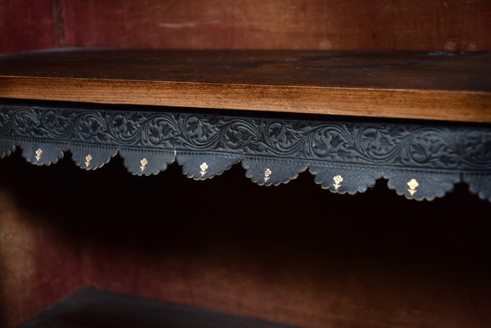 A low Victorian burr walnut breakfront bookcase featuring three arched glass doors, floral marquetry inlay, and gilt bronze mounts. View XIV