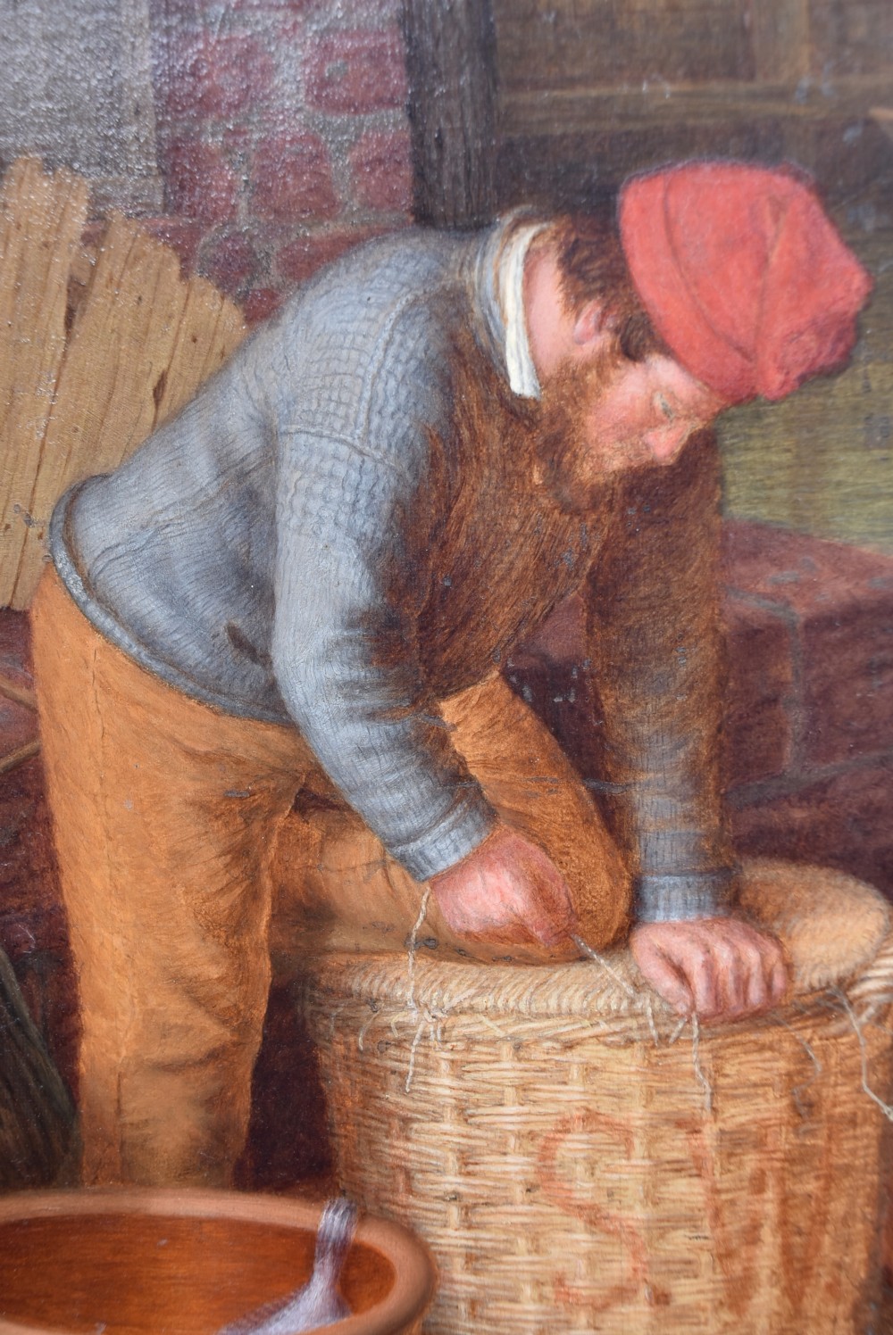 A Victorian oil painting on wood panel depicting a fisherman packing a wicker basket alongside a young girl, set within an ornate gilded frame. View IX