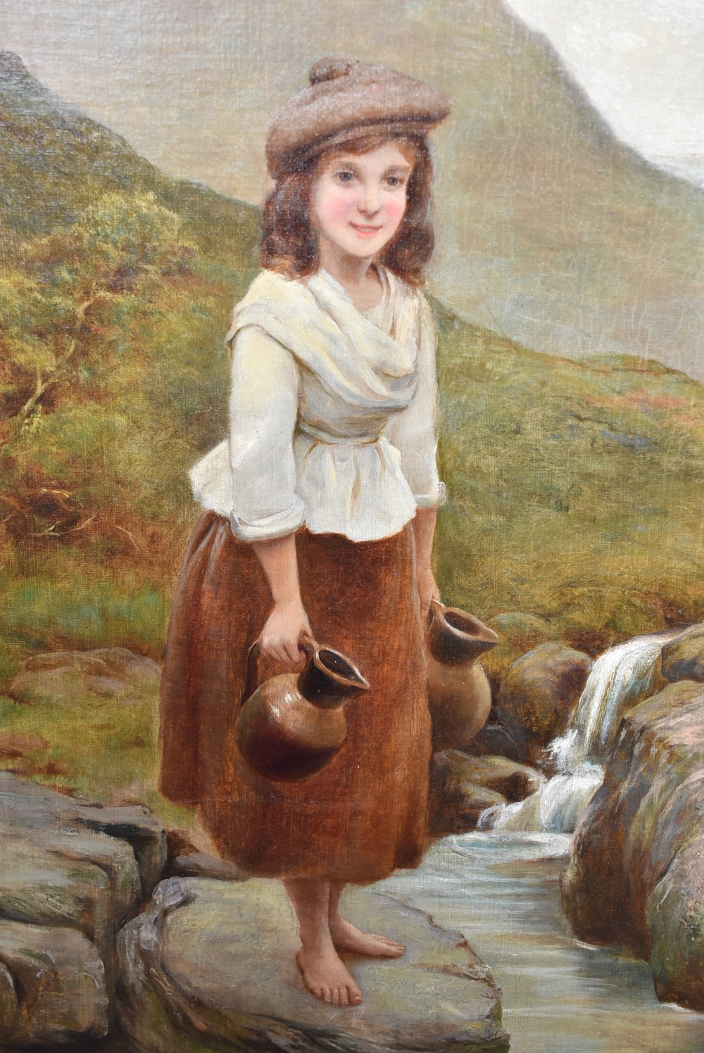 Framed oil painting depicting a young barefoot woman carrying clay jugs beside a stream in a Scottish Highland landscape. View III
