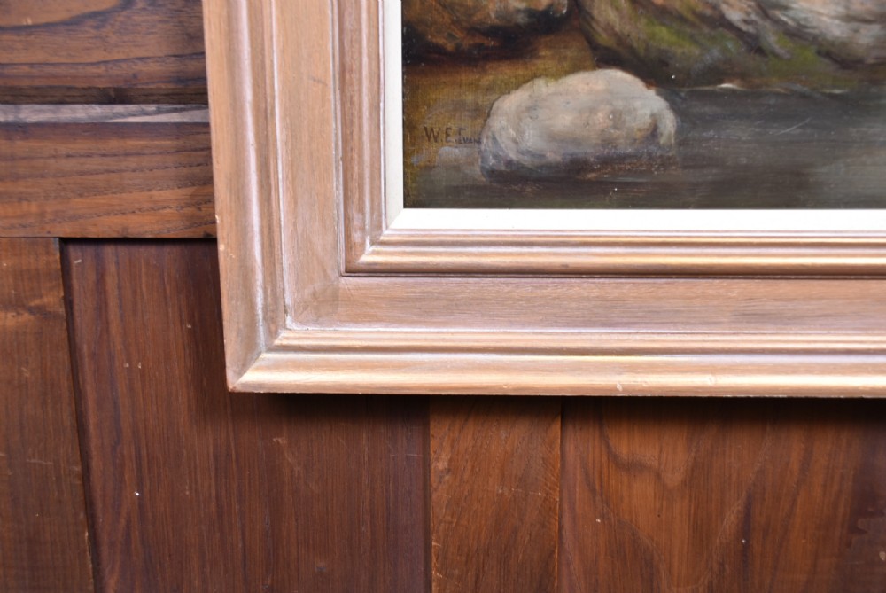Framed oil painting depicting a young barefoot woman carrying clay jugs beside a stream in a Scottish Highland landscape. View VII