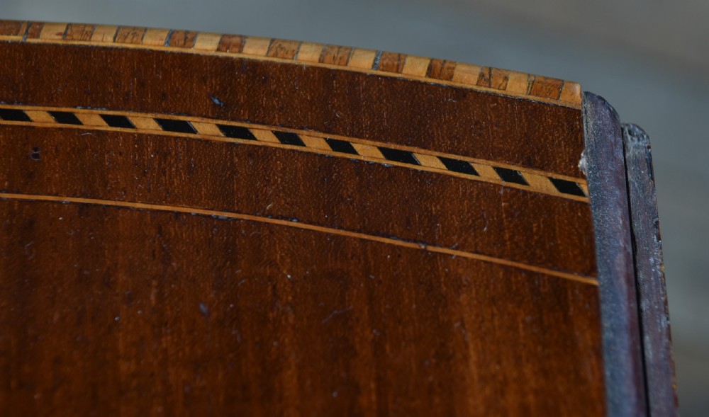 An Edwardian mahogany drop-leaf side table featuring satinwood inlaid cupboard doors and slender legs. View XII
