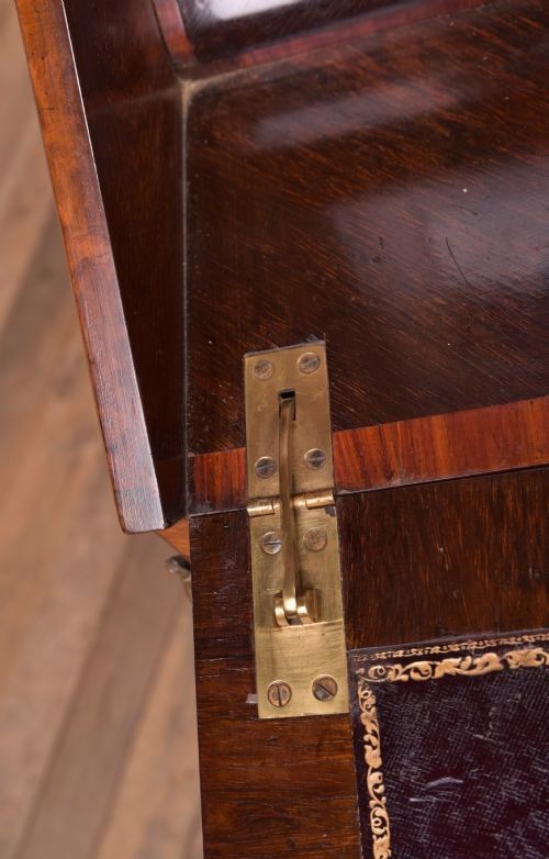 An antique French walnut ladys writing desk featuring floral marquetry, cabriole legs, brass mounts, and a raised upper section with glass cabinets and a central mirror. View VII