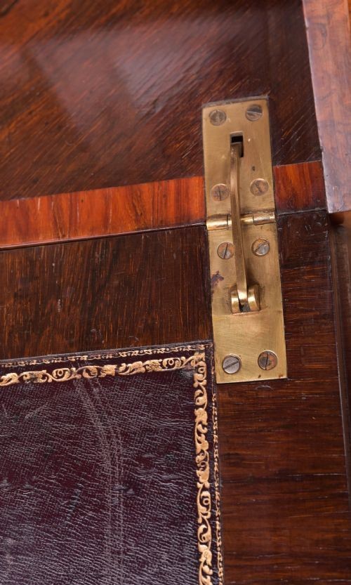 An antique French walnut ladys writing desk featuring floral marquetry, cabriole legs, brass mounts, and a raised upper section with glass cabinets and a central mirror. View VIII