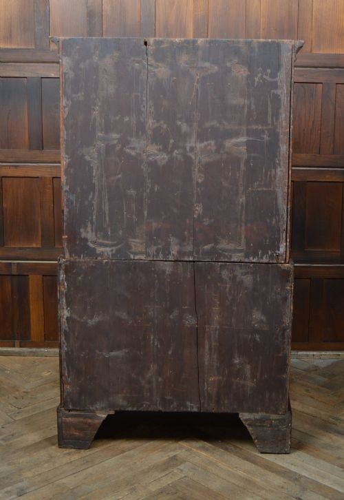 A Georgian mahogany chest-on-chest featuring two stacked drawer units with brass handles and bracket feet. View IV