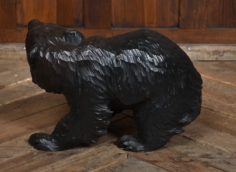 A hand-carved dark wood Japanese Kibori Kuma bear sculpture depicting a standing bear with an open mouth showing carved teeth and textured fur detailing. View VI
