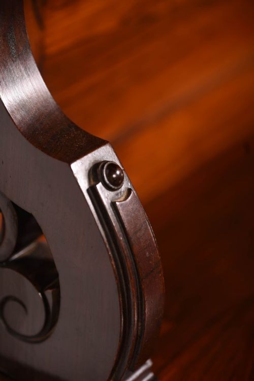 A 19th-century rosewood breakfront side cabinet featuring rich grain panels, carved accents, and a pierced top gallery rail. View XIII
