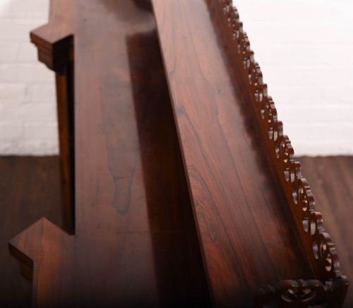 A 19th-century rosewood breakfront side cabinet featuring rich grain panels, carved accents, and a pierced top gallery rail. View XIV