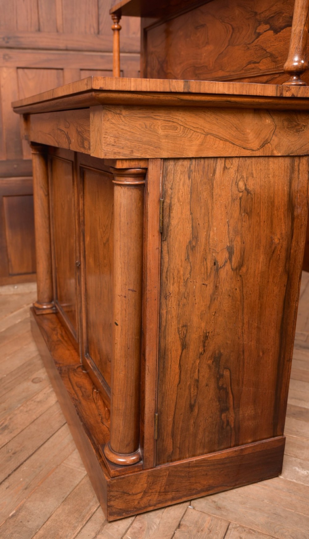 A Victorian rosewood chiffonier side cabinet featuring a raised back shelf with open fretwork gallery, turned columns, and a double-door cupboard base. View XIII