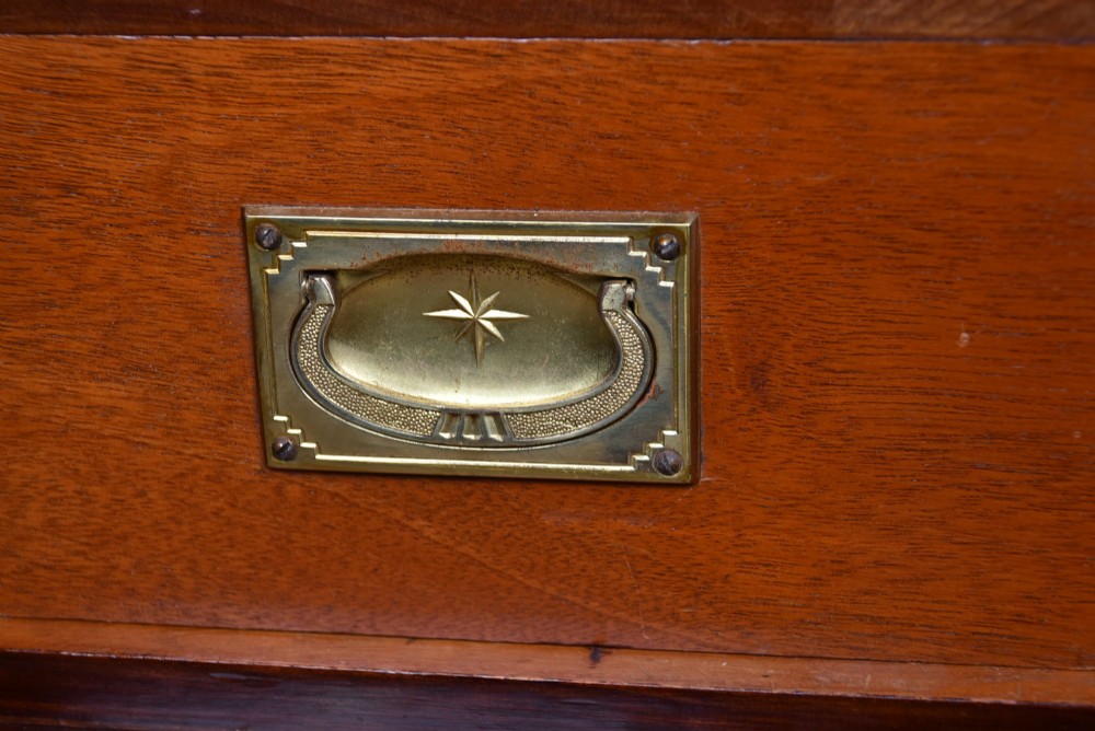 An Edwardian mahogany drinks cabinet on stand featuring chevron-matched wood veneer doors, a lower drawer with brass drop handles, and carved cabriole legs ending in ball and claw feet. View VIII