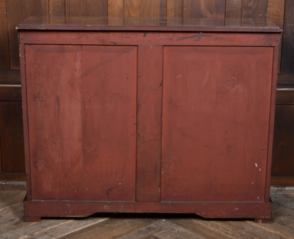 A Victorian burr walnut low cabinet featuring two glazed doors, intricate boxwood inlay, and ornate bronzed corner mounts. View XIV