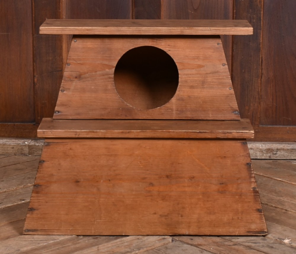 A warm brown wooden Japanese vendor stool featuring a stepped rectangular base, a circular front cutout opening, and a flat upper shelf. View II