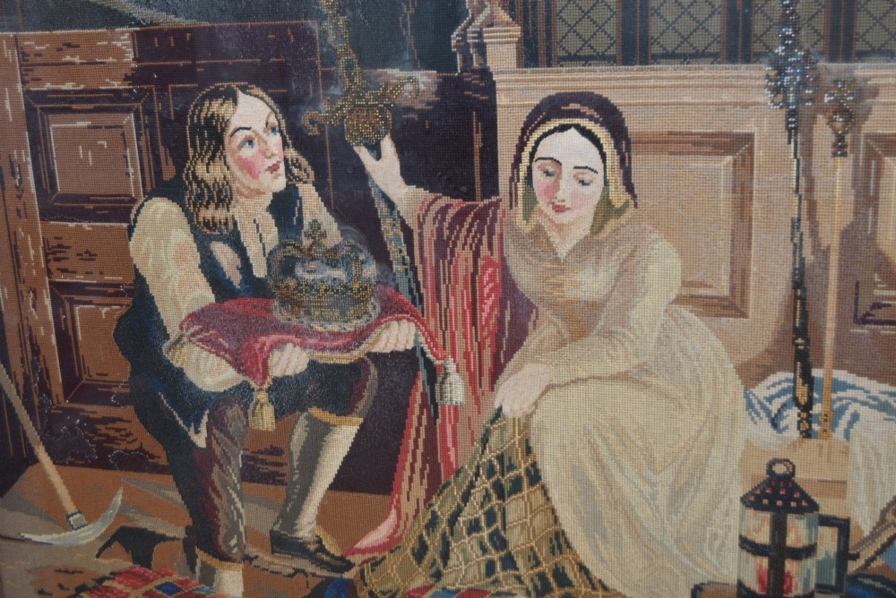 A framed needlepoint tapestry depicting figures and a crown inside an ecclesiastical interior with light streaming through a Gothic window. View II