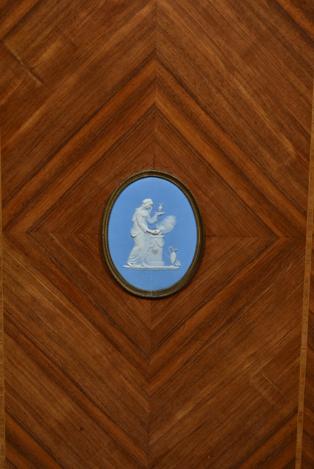 A Victorian inlaid rosewood credenza sideboard featuring central parquetry doors adorned with blue jasperware plaques, flanked by two glass-fronted side display cabinets. View V