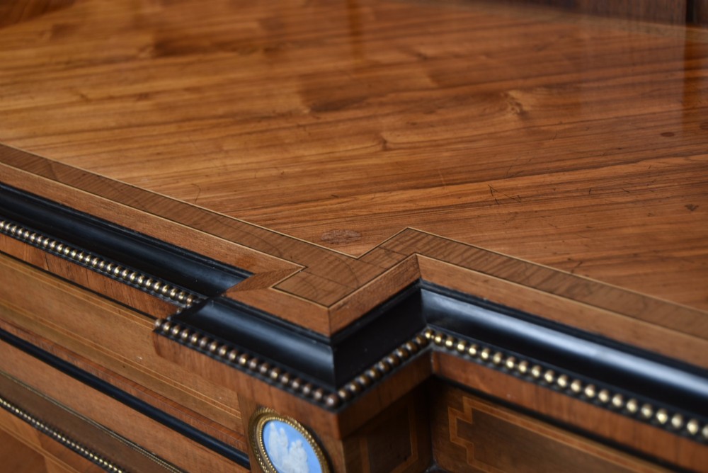 A Victorian inlaid rosewood credenza sideboard featuring central parquetry doors adorned with blue jasperware plaques, flanked by two glass-fronted side display cabinets. View VII